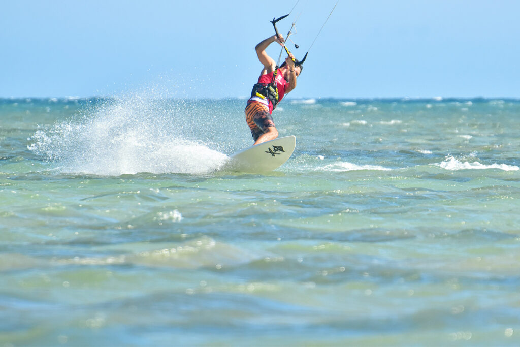 kitesurfer cutting water on My Hoa lagoon, Vietnam